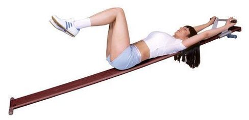 Exercise machine for the treatment of osteochondrosis at home